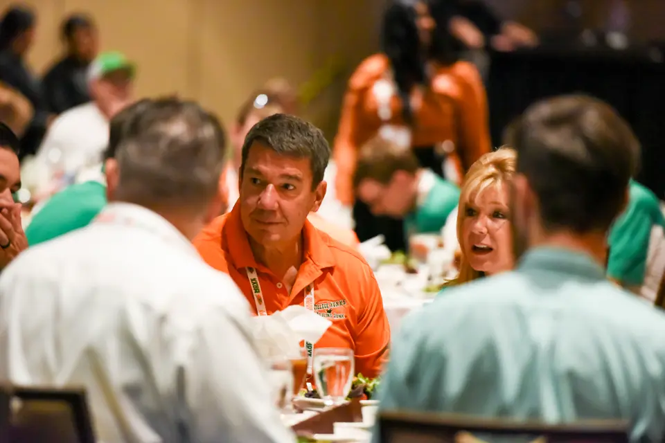 Owners and corporate team at the Annual Reunion banquet